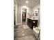 Bright bathroom leading to the walk-in closet offers upgraded fixtures at 7428 Beaufort Cir, Charlotte, NC 28227