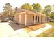 Charming single-story home featuring a welcoming front porch and well-maintained landscaping at 7428 Beaufort Cir, Charlotte, NC 28227