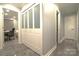Hallway closet has access to multiple rooms with sliding doors and ample storage space at 7428 Beaufort Cir, Charlotte, NC 28227