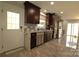 Modern kitchen boasts granite countertops, stainless steel appliances, and stylish backsplash at 7428 Beaufort Cir, Charlotte, NC 28227