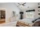 Bedroom with vaulted ceilings, large window, ceiling fan, and carpet at 7444 Hurstbourne Green Dr, Charlotte, NC 28277
