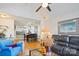 Comfortable living area with an open layout connecting to the dining and kitchen spaces at 7444 Hurstbourne Green Dr, Charlotte, NC 28277