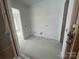 Unfinished bathroom with plumbing fixtures and natural light, ready for customization at 8038 Pawtuckett Rd, Charlotte, NC 28214