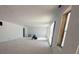 Large, unfinished living room with space to customize to your liking at 8038 Pawtuckett Rd, Charlotte, NC 28214