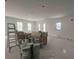 Spacious living room featuring large windows for natural light, perfect for renovations, and modern upgrades at 8038 Pawtuckett Rd, Charlotte, NC 28214
