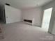 Spacious living room featuring a large window, perfect for renovations, and modern upgrades at 8038 Pawtuckett Rd, Charlotte, NC 28214