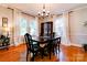 Classic dining room with hardwood floors and large windows at 902 Hawthorne Rd, Shelby, NC 28150