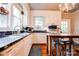 Charming kitchen featuring blue tile counters and backsplash and stainless appliances at 902 Hawthorne Rd, Shelby, NC 28150