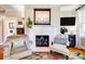 Cozy living room with fireplace, hardwood floors, and natural light at 902 Hawthorne Rd, Shelby, NC 28150