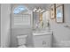 Bathroom featuring white vanity with modern fixtures at 911 Naples Dr, Davidson, NC 28036
