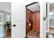 Convenient in-home elevator with wooden interior and simple controls, adding accessibility to the residence at 911 Naples Dr, Davidson, NC 28036