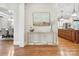 Bright hallway featuring hardwood floors and stylish decor at 9927 Clarkes View Nw Pl, Concord, NC 28027