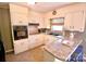 Well-organized kitchen with a stylish backsplash, ample counter space, and modern appliances at 1014 Stuart Dr, Wadesboro, NC 28170