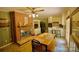 Spacious kitchen next to the dining area featuring a fireplace and modern appliances at 1014 Stuart Dr, Wadesboro, NC 28170