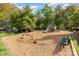 Community playground offers slides, play equipment, and green space, providing a fun recreational area at 10318 Caldwell Depot Rd, Cornelius, NC 28031