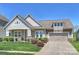 Charming single-Gathering home with a two-car garage, well-manicured lawn, and inviting front porch at 10378 Ambercrest Nw Ct, Huntersville, NC 28078