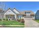 Beautiful single-Gathering home with an attached garage, front yard landscaping and a covered front porch at 10378 Ambercrest Nw Ct, Huntersville, NC 28078