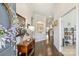 Elegant foyer featuring hardwood floors, neutral walls, and decorative accents, creating a warm entrance at 10378 Ambercrest Nw Ct, Huntersville, NC 28078