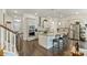 Modern kitchen with stainless steel appliances, a breakfast bar, and ample counter space at 10378 Ambercrest Nw Ct, Huntersville, NC 28078