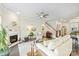 Spacious living room featuring a fireplace, staircase, and neutral decor at 10378 Ambercrest Nw Ct, Huntersville, NC 28078