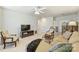 Inviting living room featuring neutral decor, comfortable seating, and a cozy atmosphere at 10378 Ambercrest Nw Ct, Huntersville, NC 28078