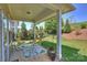 Charming covered patio area offering a tranquil space to unwind and enjoy the backyard at 10378 Ambercrest Nw Ct, Huntersville, NC 28078