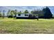 Exterior shot of the home and yard at 105 Branson Dr, Olin, NC 28660