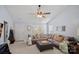 Bright and spacious living room featuring plush sectional sofa, lots of natural light and tile entryway at 105 Sterling Ter, Mooresville, NC 28115