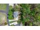 Aerial view of a home with a large backyard surrounded by green trees at 1158 Waterford Dr, Hickory, NC 28602