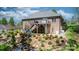 Landscaped backyard with a deck and a firepit at 1158 Waterford Dr, Hickory, NC 28602