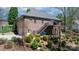 A spacious backyard featuring a deck, landscaping, and a brick exterior at 1158 Waterford Dr, Hickory, NC 28602