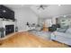 Spacious living room featuring a fireplace, wood floors, and neutral decor at 1158 Waterford Dr, Hickory, NC 28602