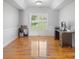 Bright office space with hardwood floors, large window, and plenty of natural light at 1158 Waterford Dr, Hickory, NC 28602