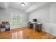 Bright office space with hardwood floors, large window, and plenty of natural light at 1158 Waterford Dr, Hickory, NC 28602