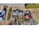 Aerial view showing the house roofline, outbuildings and surrounding yard at 119 Loray Ln, Statesville, NC 28625