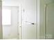 Hallway with closet, towel bar and small window for natural light at 1230 Roberts St, China Grove, NC 28023
