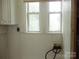 Small laundry room with hook ups at 1230 Roberts St, China Grove, NC 28023