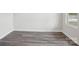 Bright bedroom with wood-look vinyl floors and a window for natural light at 1240 Morehead Dr, Salisbury, NC 28144