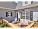 Inviting back deck featuring comfortable seating, perfect for outdoor relaxation and enjoying the view at 126 Top Flite Dr, Statesville, NC 28677