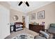 Neutral bedroom with crib-changing table, ceiling fan, and animal-themed rug at 126 Top Flite Dr, Statesville, NC 28677