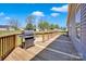 Spacious wooden deck area featuring a grill, perfect for outdoor entertaining and relaxation at 126 Top Flite Dr, Statesville, NC 28677