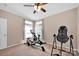 Bright exercise room with rowing machine, exercise bike and inversion table at 126 Top Flite Dr, Statesville, NC 28677