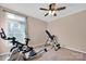 Workout room with exercise bike, rowing machine, and inversion table at 126 Top Flite Dr, Statesville, NC 28677