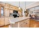 Kitchen with a spacious island, custom cabinets and updated appliances, offering both functionality and style at 126 Top Flite Dr, Statesville, NC 28677