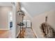 Bright laundry area featuring a washer, dryer, and a convenient clothing rack at 126 Top Flite Dr, Statesville, NC 28677