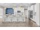 Modern kitchen featuring stainless steel appliances, a large island, and stylish pendant lighting at 12710 Es Draper Dr, Huntersville, NC 28078