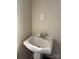 Standard bathroom sink with neutral wall color and visible electrical outlet at 132 Loomis St, Chester, SC 29706