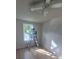Well-lit bedroom with fresh paint, modern fan, and new vinyl floors at 132 Loomis St, Chester, SC 29706