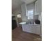 Well-equipped kitchen featuring modern cabinets and countertops, with a view to the yard at 132 Loomis St, Chester, SC 29706
