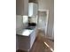Well-lit kitchen featuring new cabinets and countertops, perfect for cooking at 132 Loomis St, Chester, SC 29706